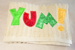 Yum Applique: A Playful, Versatile Embroidery Design for Boutique Apparel